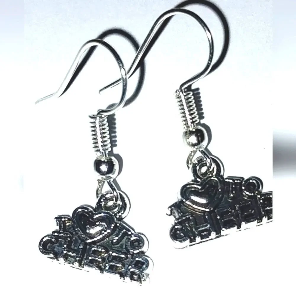 Hand crafted antique cheerleader earrings